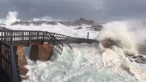 Bridge Broken Apart by Huge Storm