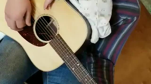 baby and daddy's guitar