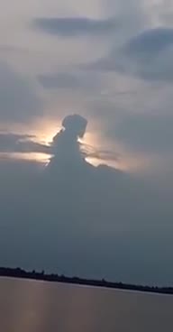 Amazing Clouds In Front Of Setting Sun Looks Like Person
