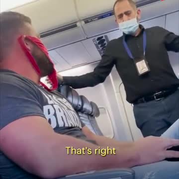 Perizoma rosso in aereo al posto della mascherina