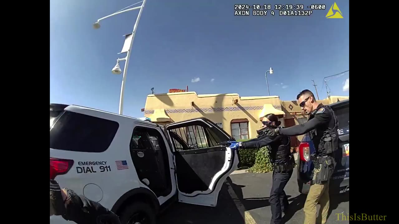 Bodycam shows the fatal police shooting of an armed man in custody and in the back of the police car