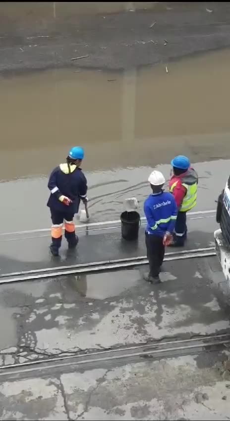 Transnet responds to viral video of workers using makeshift tools and a bucket to remove rainwater