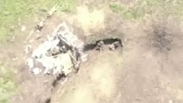 Ukraine drone drops grenade in Russian soldiers trench