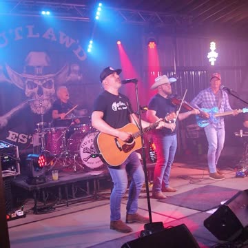 Outlaw'D band singing Dierks Bentley song Lot of Leavin' Left to Do at Kountry Bar