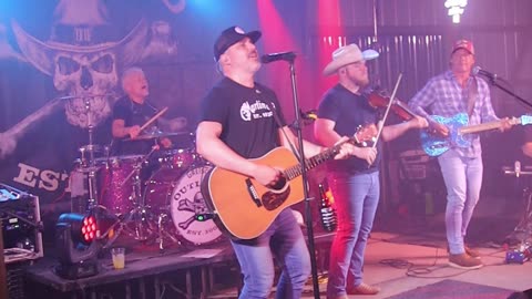 Outlaw'D band singing Dierks Bentley song Lot of Leavin' Left to Do at Kountry Bar