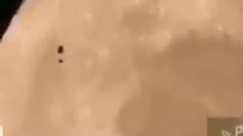 FINALLY WE SEE SATELLITE IN FRONT OF THE MOON