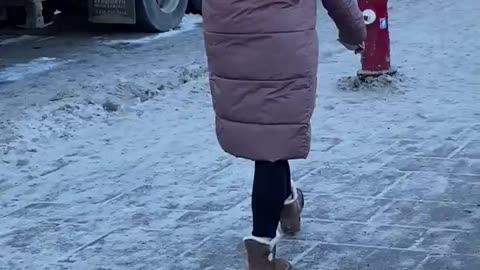 This masked woman was taking photos of trucks in Ottawa. Can anyone identify her?