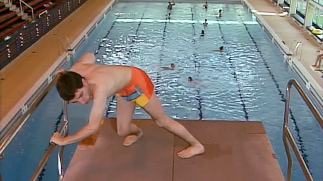 Mr Bean goes swimming and tries to attempt the diving board, fuuny