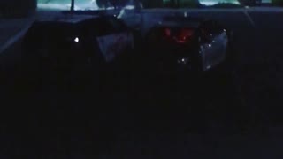 Cops Having a Lightsaber Battle in a Parking Lot