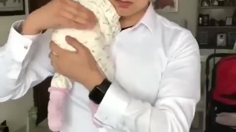 Father Is make baby sleeping and play games with leg!