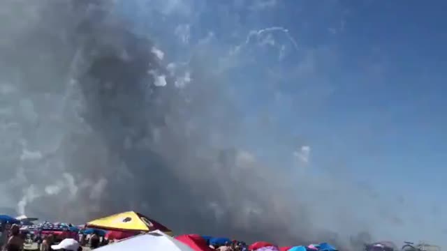 Fireworks truck explodes on beach causing people to run for their lives