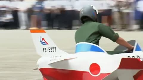 Plane shaped scooters take off to mark 60 years for Japan's Air Self Defence Force