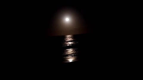 Full Moon Rise Over The Atlantic Ocea