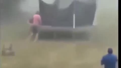 Man flies away with trampoline