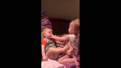 Toddler hilariously attempts to bottle feed baby brother #Shorts-