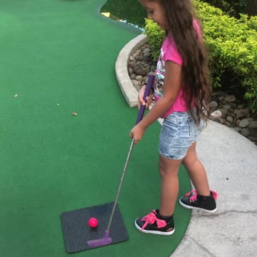 Playing golf