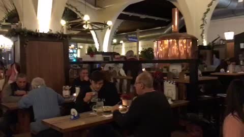 HB pub Berlin. People have a rest have a beer and waiting for the game