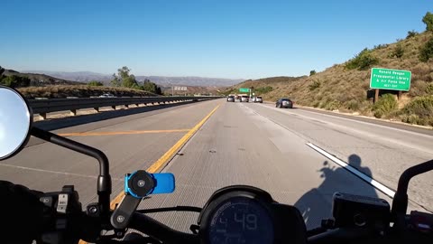 Driver Rear Ends Vehicle at Backed-Up Off-Ramp