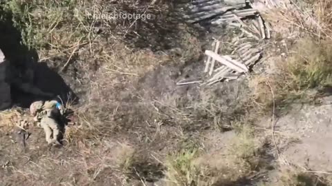 A Russian Soldier Flanks and Kills 2 Ukranians (Graphic Content Warning)