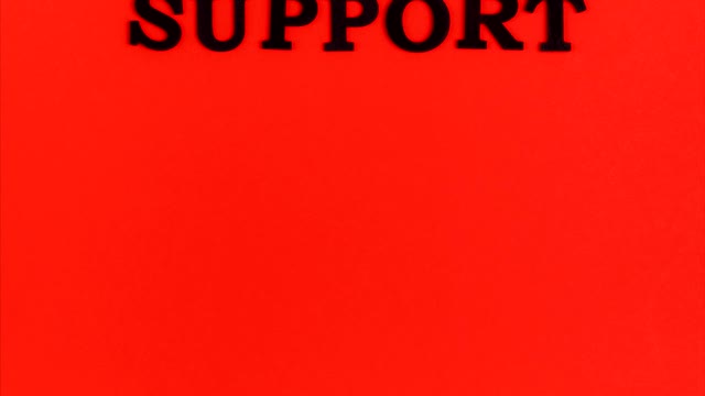 An Animation of the Word Support on a Red Background