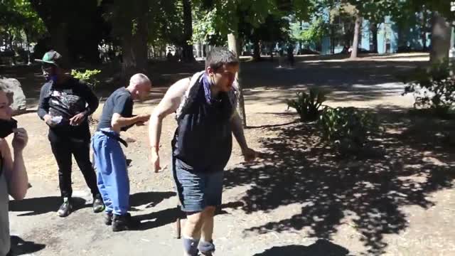 A BLM protester gets maced after harassing Trump supporters in Portland.