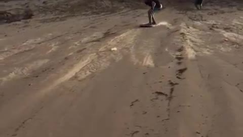 Sandy Boogie Board Tumble at the Beach