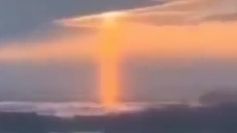 Orange light leaking from a Russian cloud [Mystery]