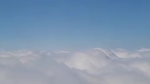 the sky above cloud viewed from the airplane