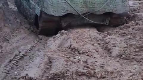 The Swedish version of the Leopard Strv 122 gets stuck in the mud.