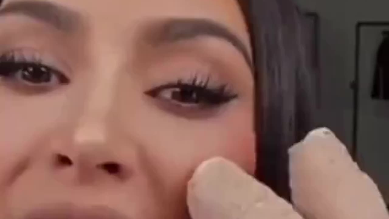 Kim Kardashian had her fingers taped up claiming she hurt herself here