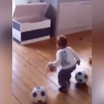 Baby are playing with football