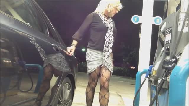 Crossdresser Fills Up At Gas Station Flashing Some Leg