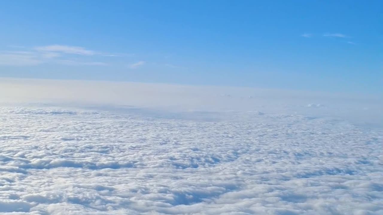 a sea of ​​clouds over a mountain