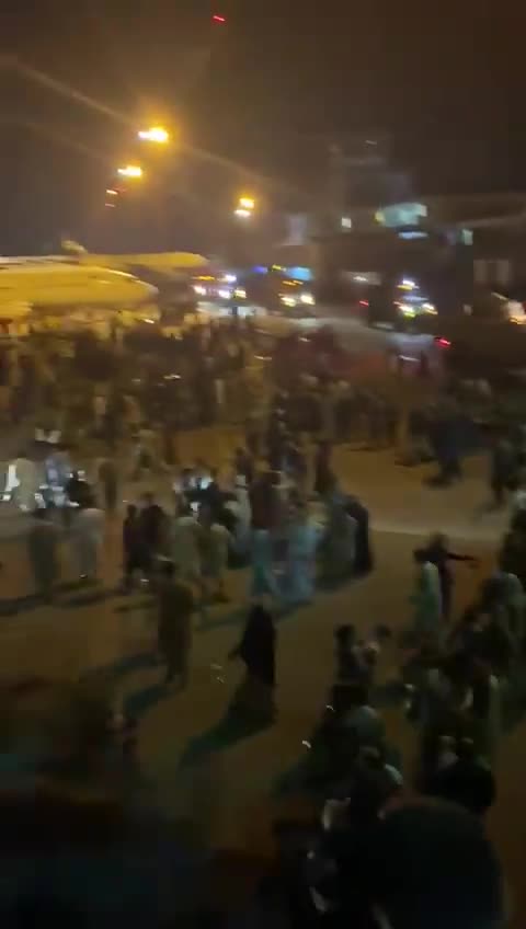 Hundreds Fill the Tarmac of Kabul International Airport While Running From Taliban