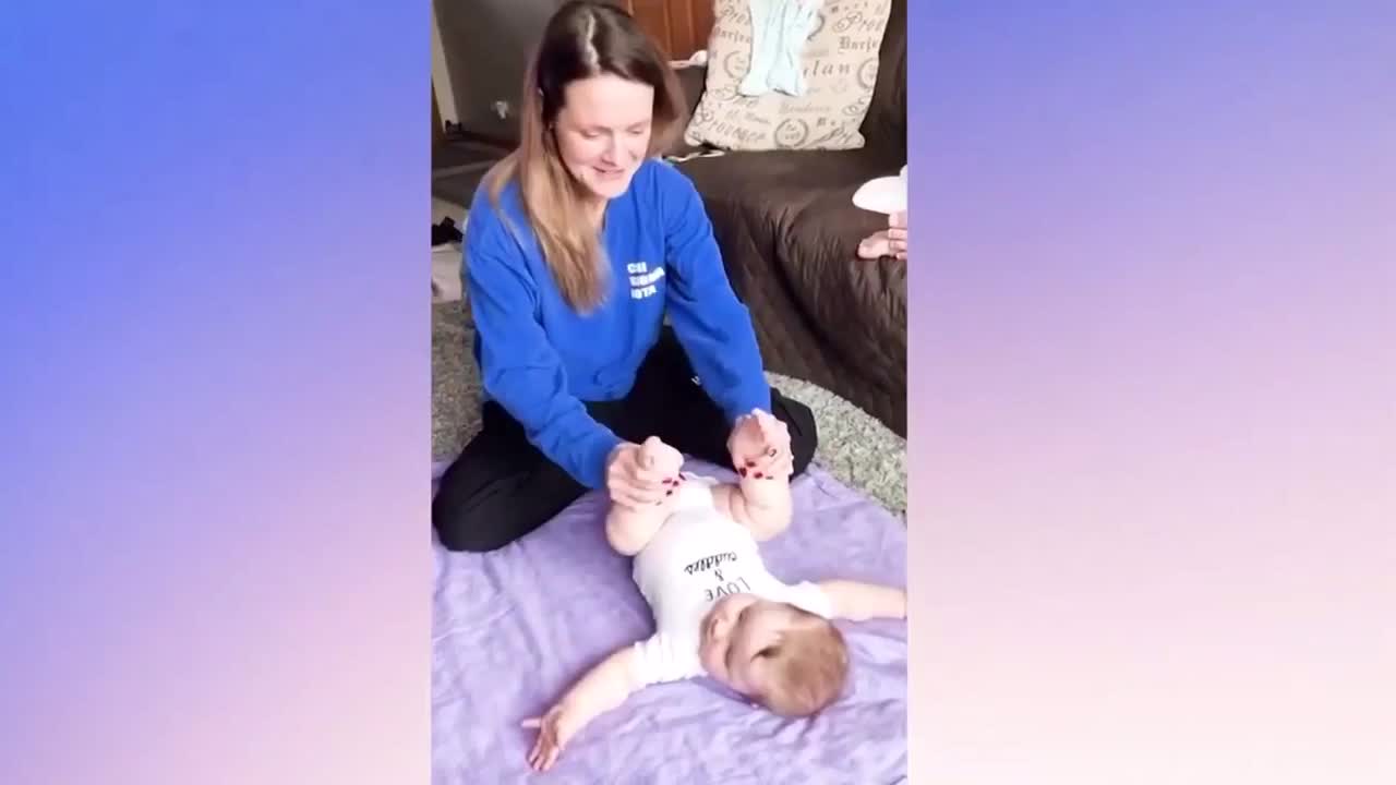 See how little toddler doing exercises with her mom amazing footages