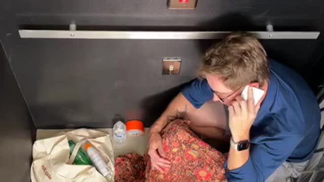 she's about to give BIRTH in an elevator