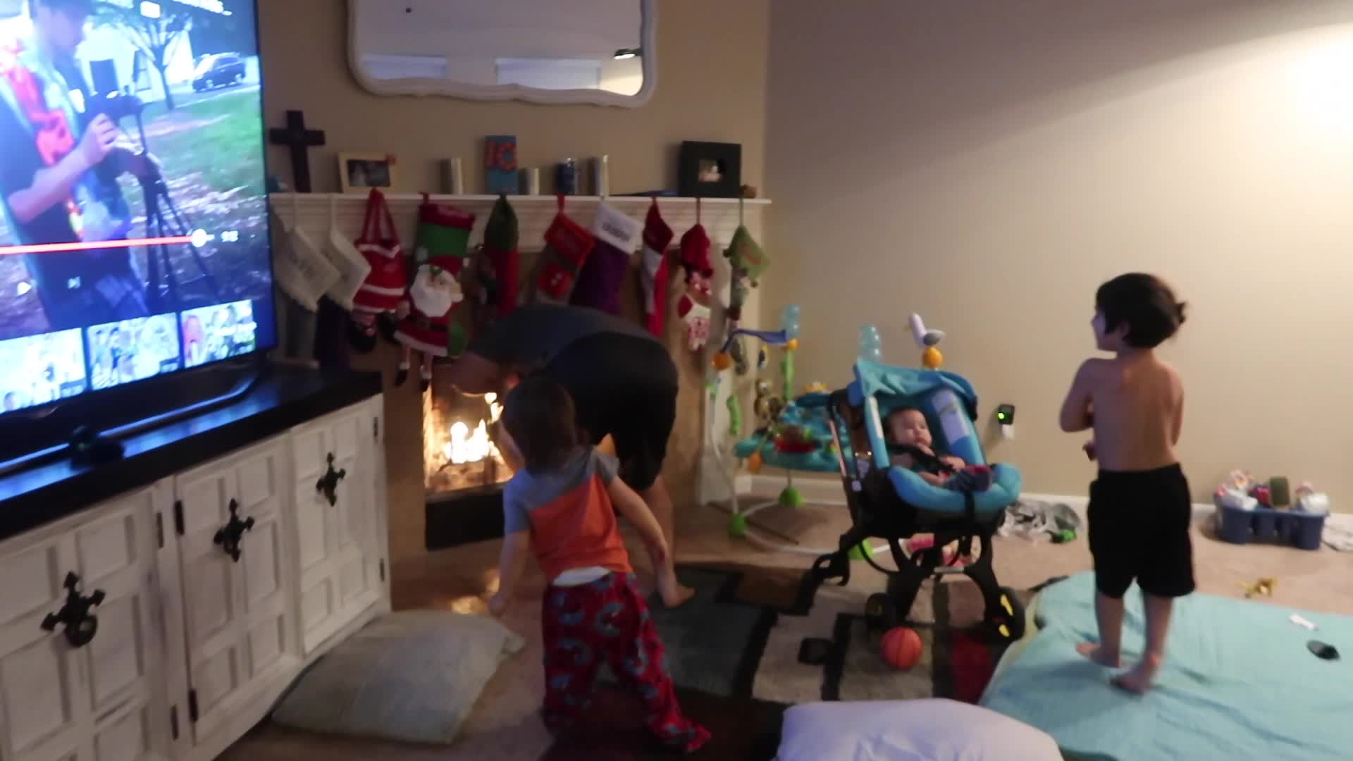 Dad pranks kids, throws Christmas gift in the fire