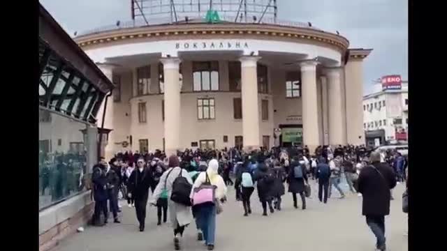 Passengers run away from Kyiv railway station in Ukraine