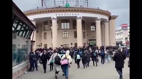 Passengers run away from Kyiv railway station in Ukraine