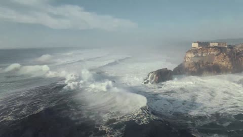 Large waves crashing on the rocky shore_batch