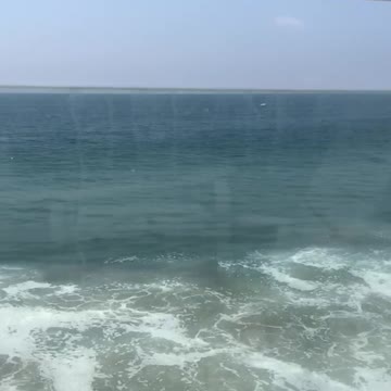 Girls kids floaties beach knocked out in by wave