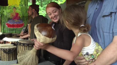 Ren Fest: Doug and Cally play the drums.