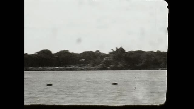 Plane flies under Belle Isle Bridge