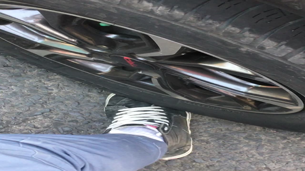 Foot Gets Stuck Under Car