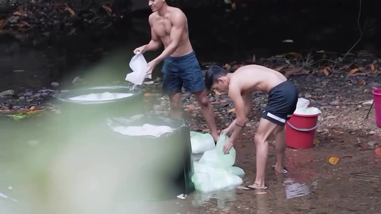 naked in nature and soaking in ice water