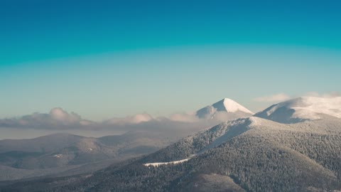 Clear blue sky over beautiful snowy mountains