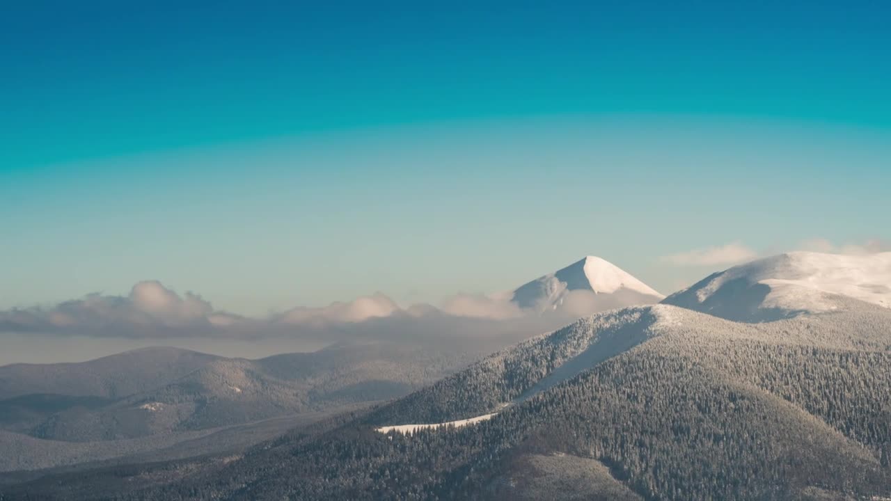 Clear blue sky over beautiful snowy mountains