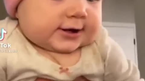 Baby bounces in slow motion