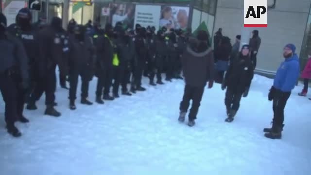 Protest trucks leave Parliament Hill in Ottawa