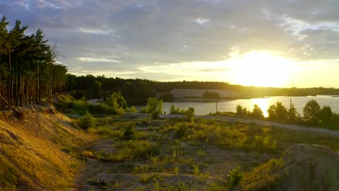 Wonderful perspective on Sunset on a stream close to a valley